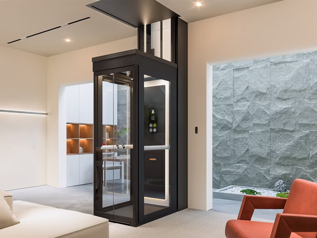 Black glass Ascenda home elevator in a modern minimalist interior.